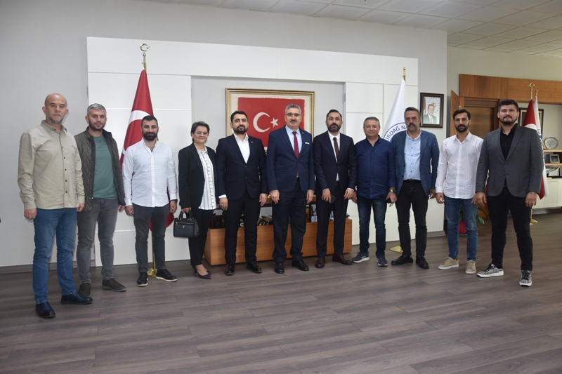 MHP'den Rektör Şahin'e Nezaket Ziyareti